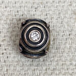 Retired Pandora sterling circles with cz charm